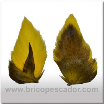 Bucktail completo teñido. Color amarillo.
